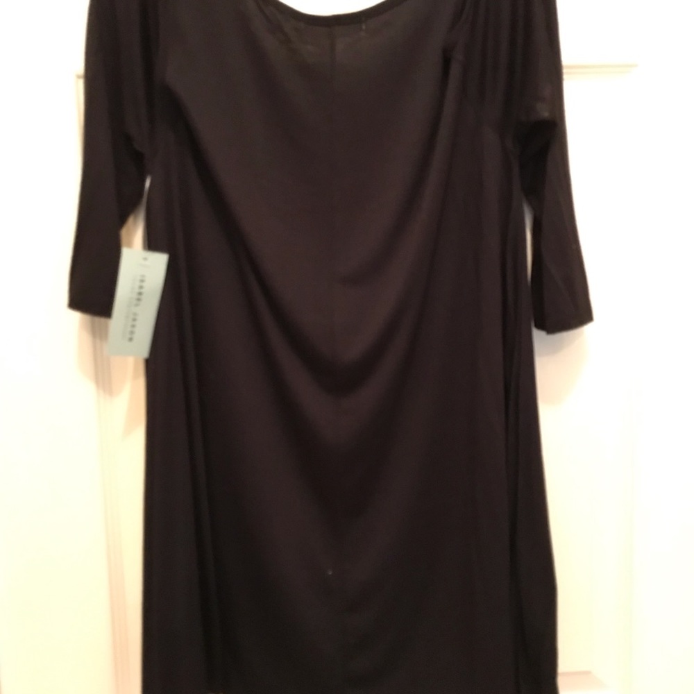 Black knit tunic length cold shoulder top. NWT